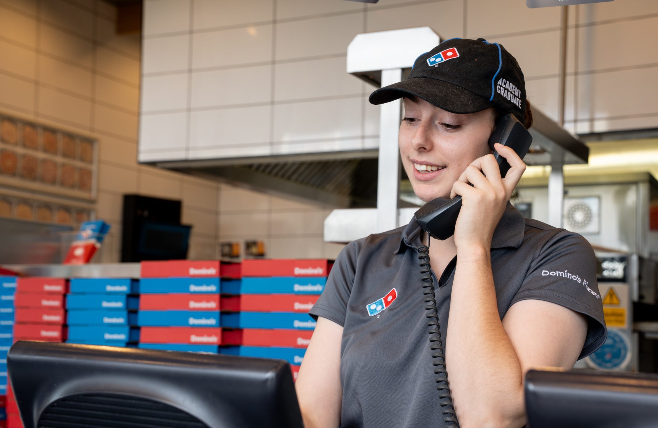 Domino's Colleague taking a phone order